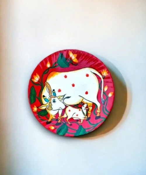 Vibrant Pichwai Cow Decor Plate | Red & Blue | #CreateURCombo | Home Decor | Wall Hanging | 10 inch Art Culture Decor Plates, Artwork, Bengali Art Culture Decor Plates, Decor Plates, Decorative Items, Decorative Plates, Decorative Wall Art, Drawing Room, Eco-Friendly, Handcrafted, Handicrafts, Handmade, Handpainted, Home Decor, Home Interior Decoration, Living Room, Melamine Decor Plates, Paintings, Pichwai Cow, Pichwai Cow Decor Plates, Religious Decor Plates, Wall Art, Wall Decor, Wall Hanging, Wall Plates