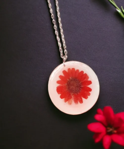 Red Daisy Necklace Timeless Floral Charm | Colour of Love #HandmadeJewellery Anniversary Gifts, Artwork, Birthday Gifts for Her, Botanical Jewellery, Botanical Necklace, Daisy Series, Eco-Friendly, Floral Jewellery, Floral Necklace, Flower Jewellery, Flower Necklace, Gifts for Mother, Gifts for Wife, Gifts for Women, Handcrafted, Handicrafts, Handmade, Jewellery, Mother's Day Gift Ideas, Nature Jewellery, Necklace, Online Jewellery Store, Resin Jewellery, Valentine's Day Gift