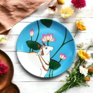 Pichwai Cow #PichwaiCow White & Blue Decor Plate | Home Decor | Wall Hanging | 10 inch Art Culture Decor Plates, Artwork, Bengali Art Culture Decor Plates, Decor Plates, Decorative Items, Decorative Plates, Decorative Wall Art, Drawing Room, Eco-Friendly, Handcrafted, Handicrafts, Handmade, Handpainted, Home Decor, Home Interior Decoration, Living Room, Melamine Decor Plates, Paintings, Pichwai Cow, Pichwai Cow Decor Plates, Religious Decor Plates, Wall Art, Wall Decor, Wall Hanging, Wall Plates