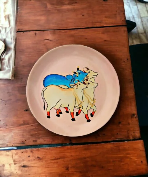Pichwai Cow #PichwaiCow Cream & Blue Decor Plate | Home Decor | Wall Hanging | 10 inch Art Culture Decor Plates, Artwork, Bengali Art Culture Decor Plates, Decor Plates, Decorative Items, Decorative Plates, Decorative Wall Art, Drawing Room, Eco-Friendly, Handcrafted, Handicrafts, Handmade, Handpainted, Home Decor, Home Interior Decoration, Living Room, Melamine Decor Plates, Paintings, Pichwai Cow, Pichwai Cow Decor Plates, Religious Decor Plates, Wall Art, Wall Decor, Wall Hanging, Wall Plates