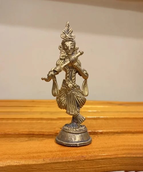 Lord Krishna with Flute Dokra Showpiece | Bikna Bankura #BrassArt (Gold) | GI TagArtwork , Bikna Dokra , Decorative Items , Drawing Room , Eco-Friendly , Ek Chala , GI Tagg Products , Handicrafted , Handicrafts , Handmade , Handpainted , Home Decor , Home Interior Decoration , Idols , Living Room , Maa Durga , Showpieces